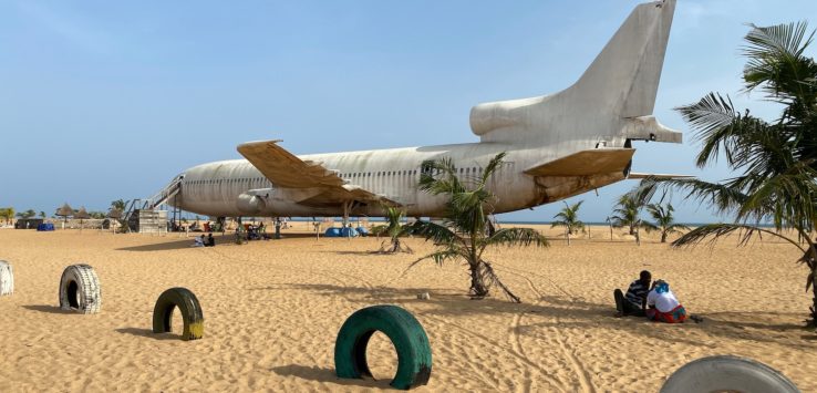 an airplane on the sand