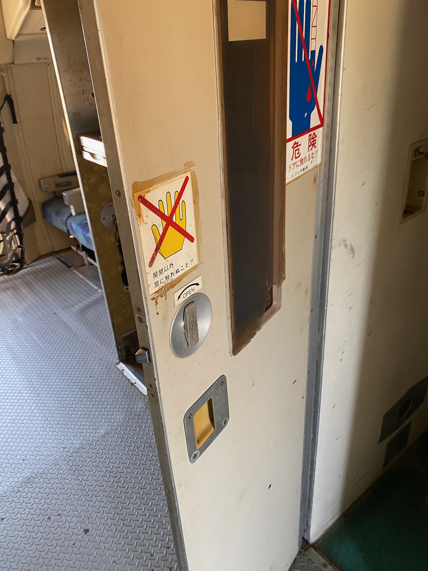 a door with a no smoking sign