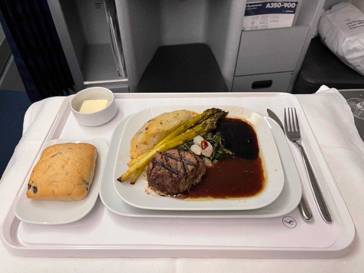 a plate of food on a tray