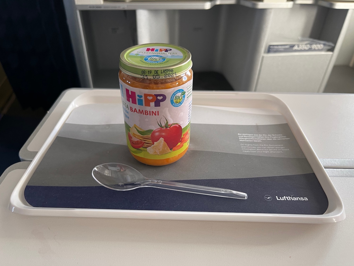 a jar of baby food on a tray