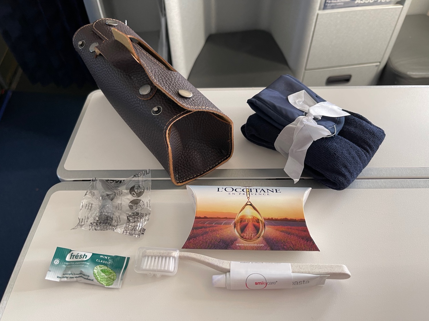 a bag and toothbrush on a table