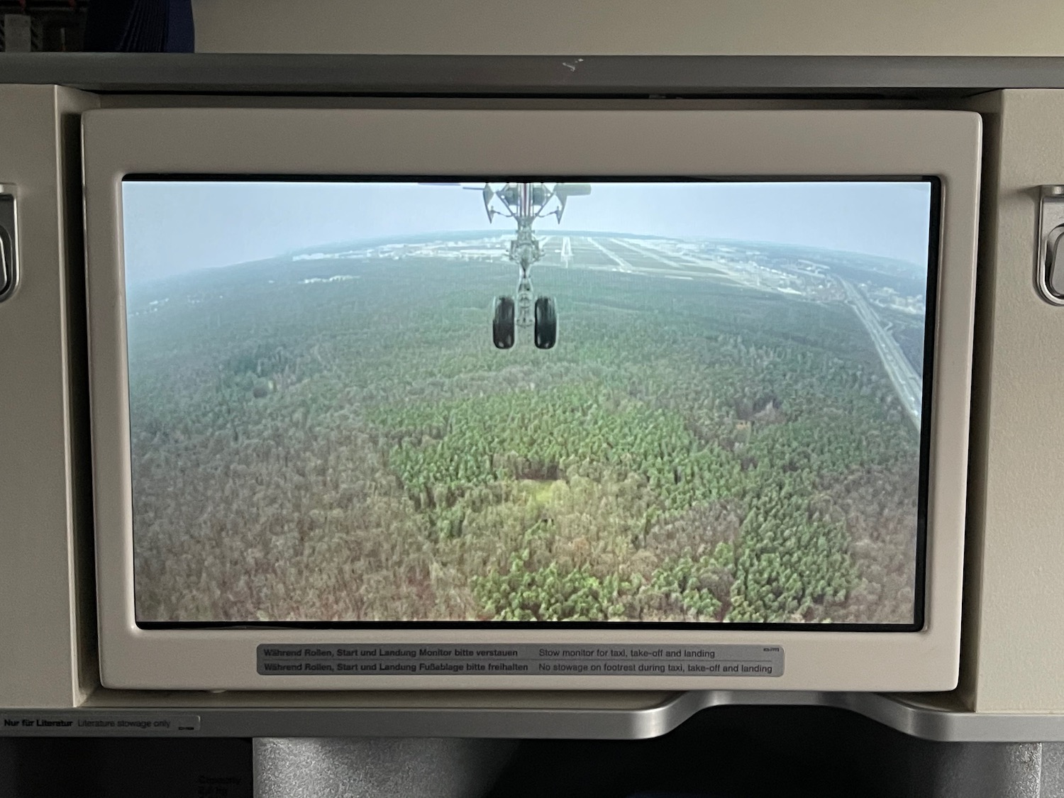 a screen with a plane landing on it