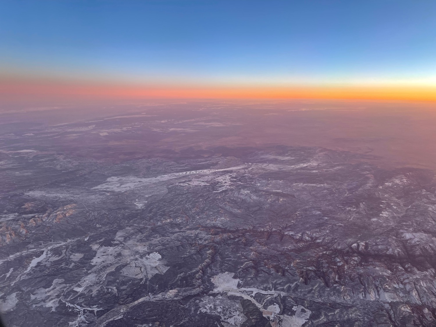 an aerial view of a snowy landscape