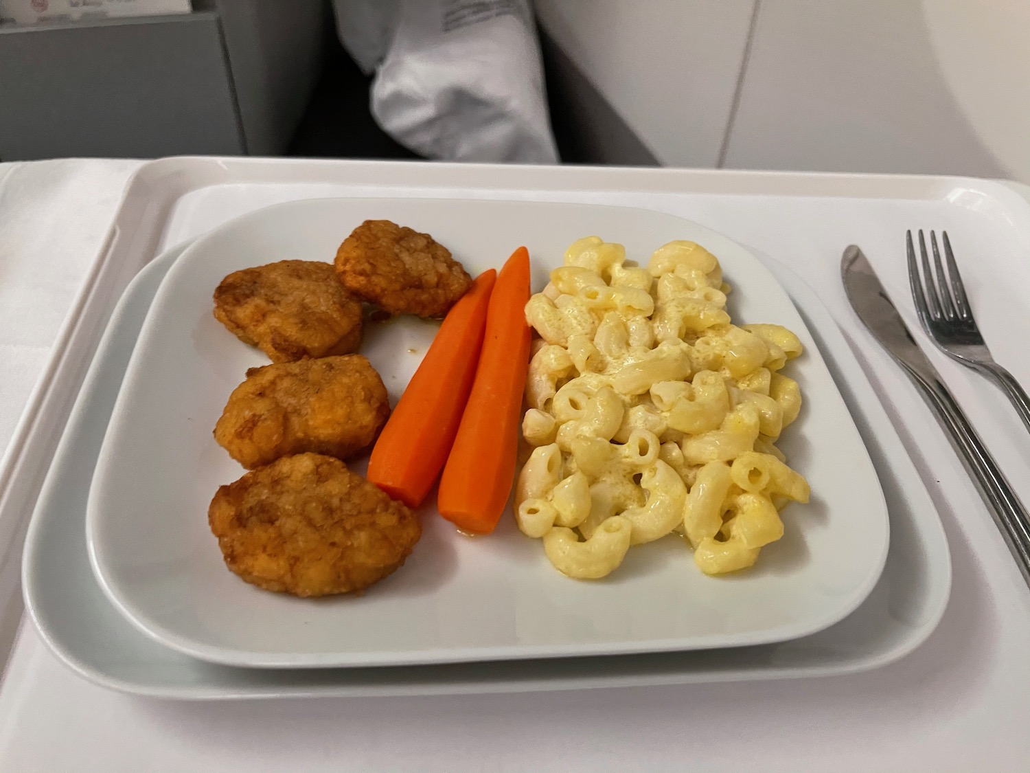 a plate of food on a tray