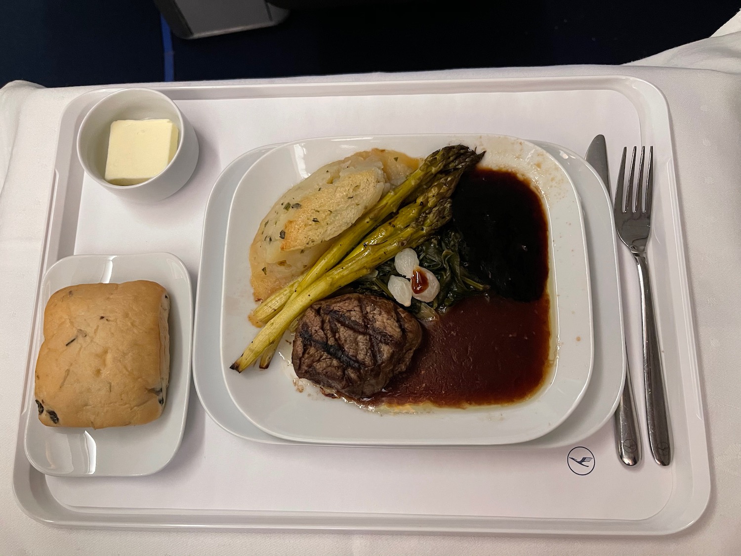 a plate of food on a tray