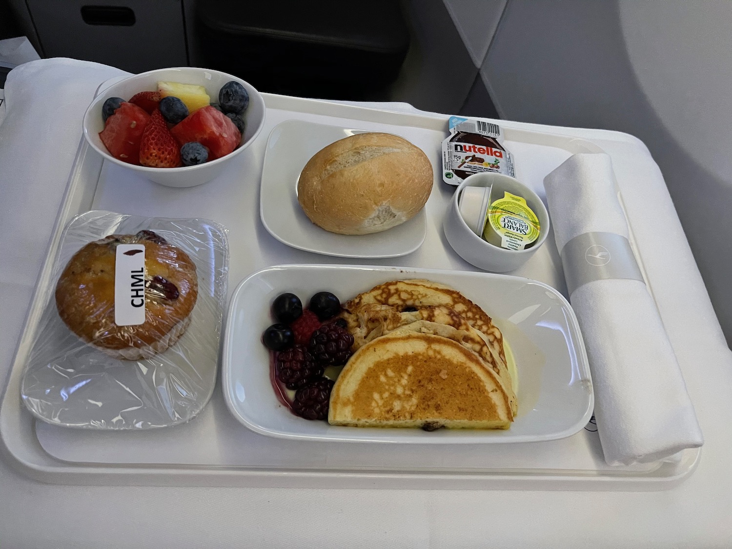 food on a tray on a plane