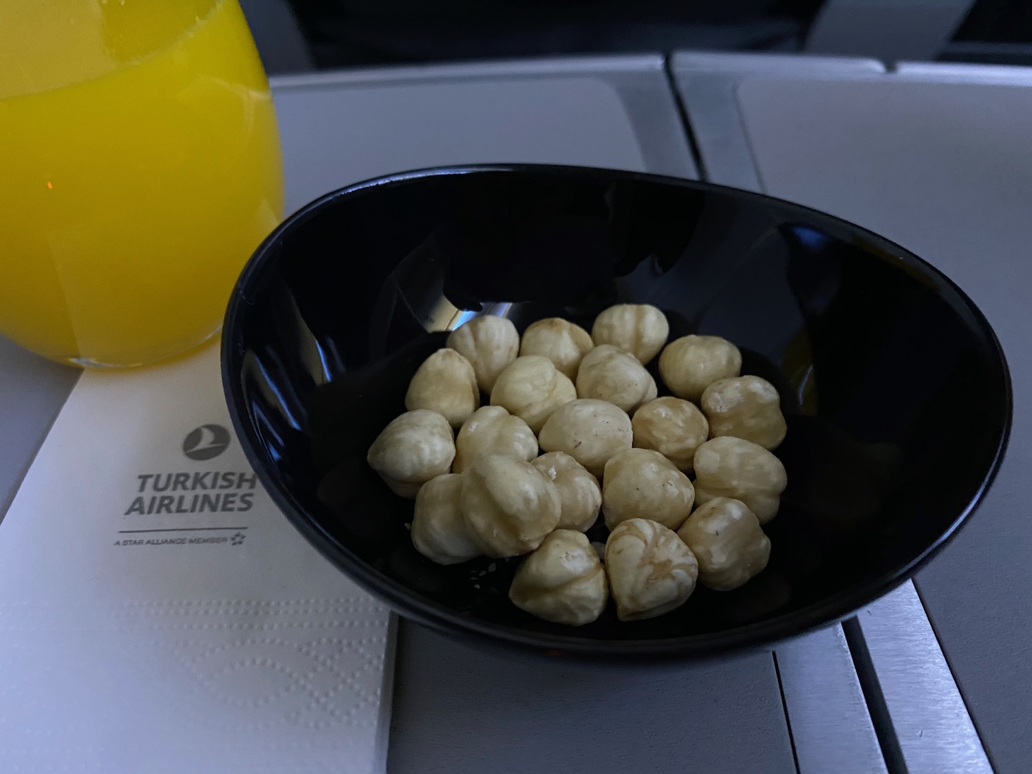 a bowl of nuts on a table