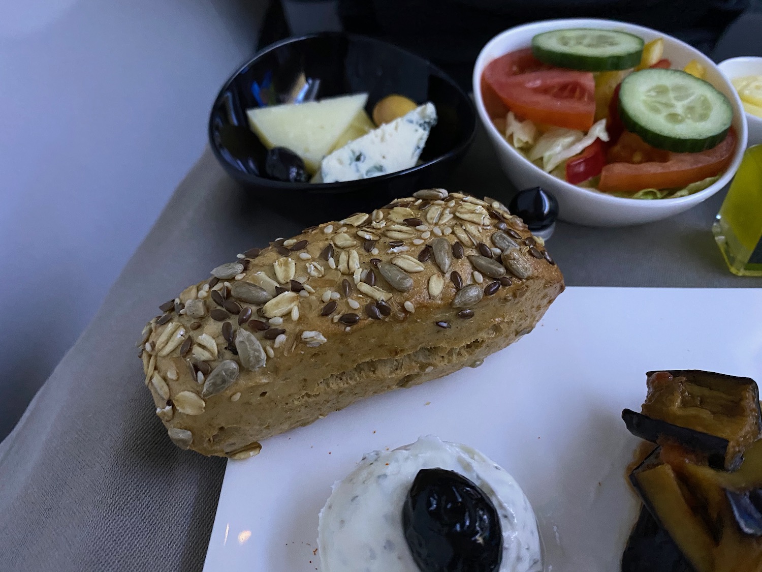 a bread and salad on a plate