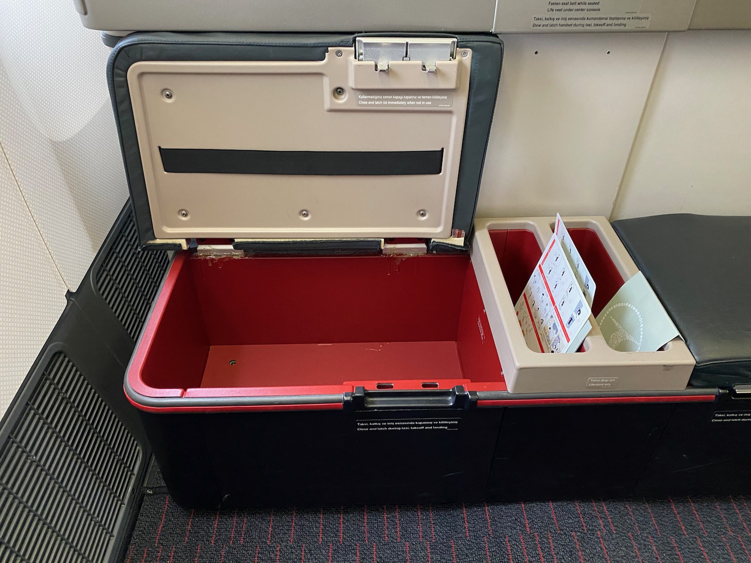 a black and red box with a red lid