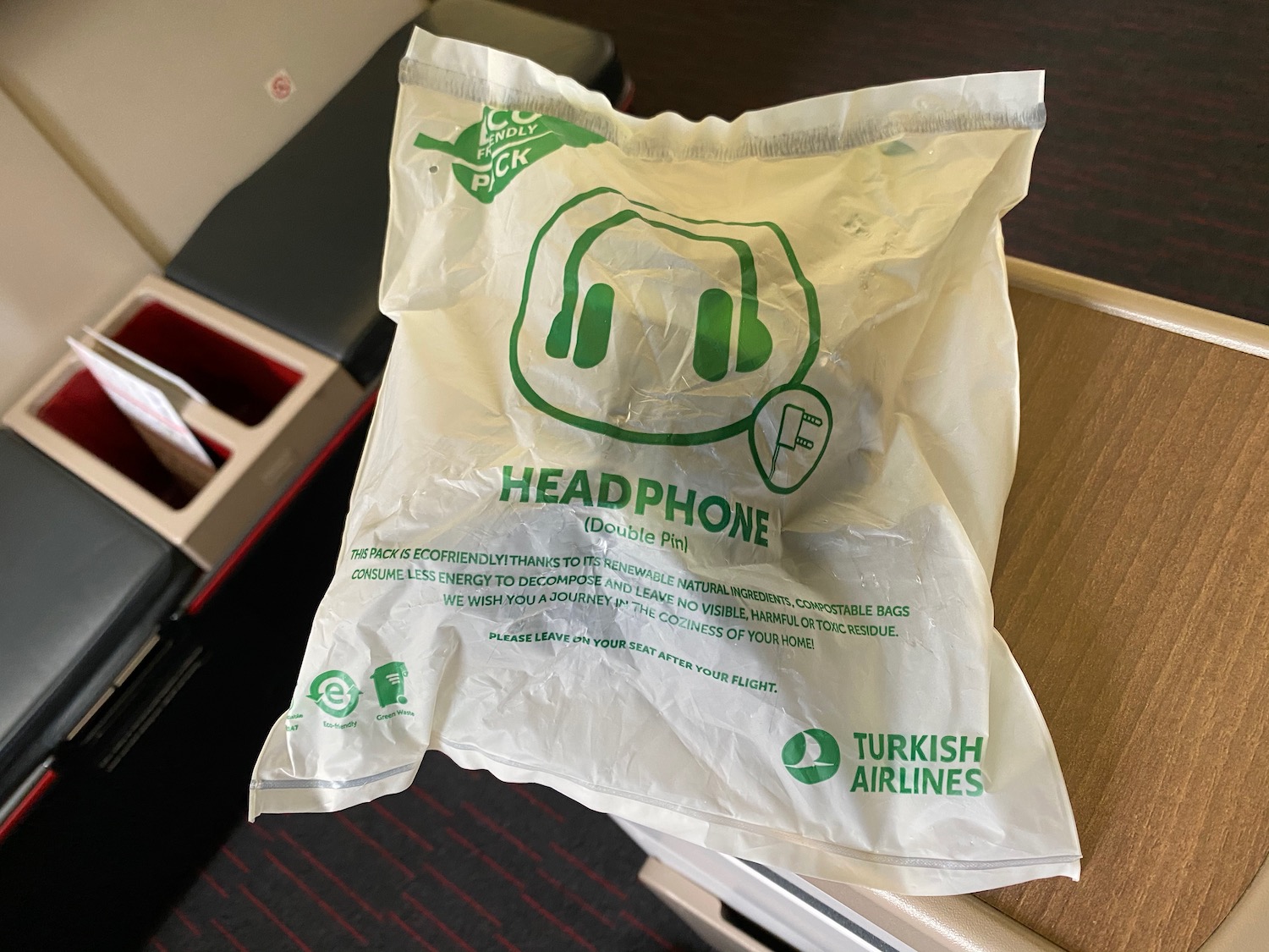 a plastic bag with green text on it