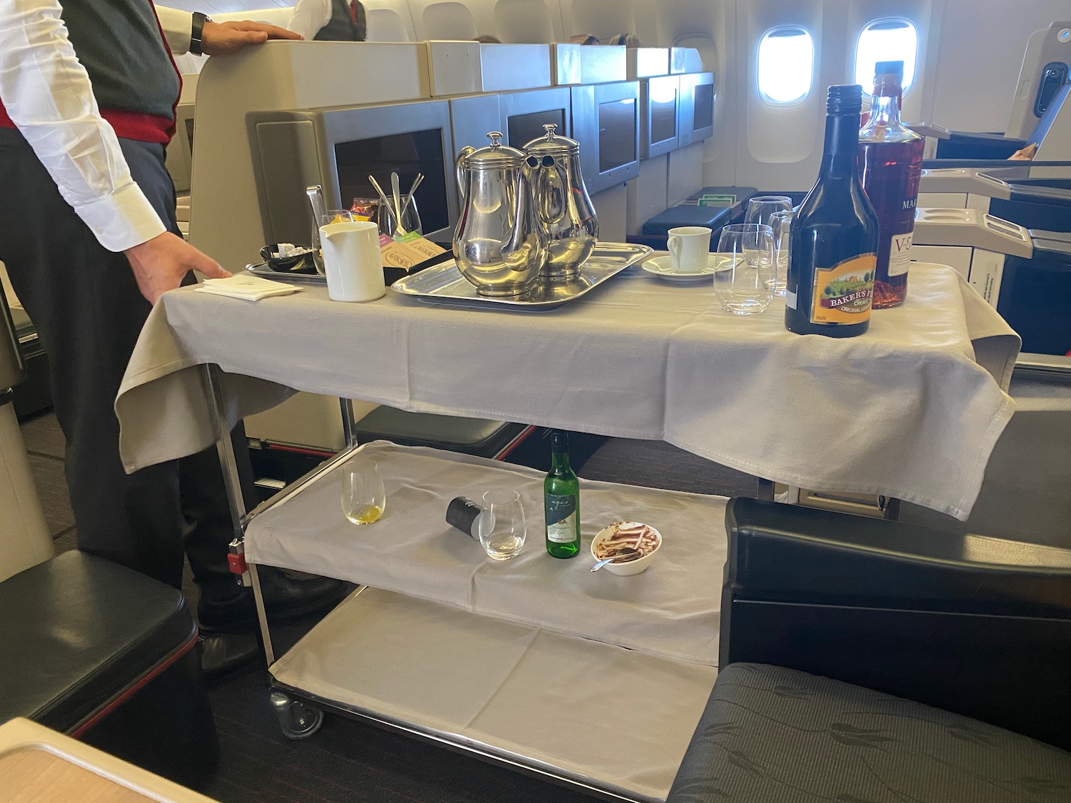 a table with a tray of food and drinks on it