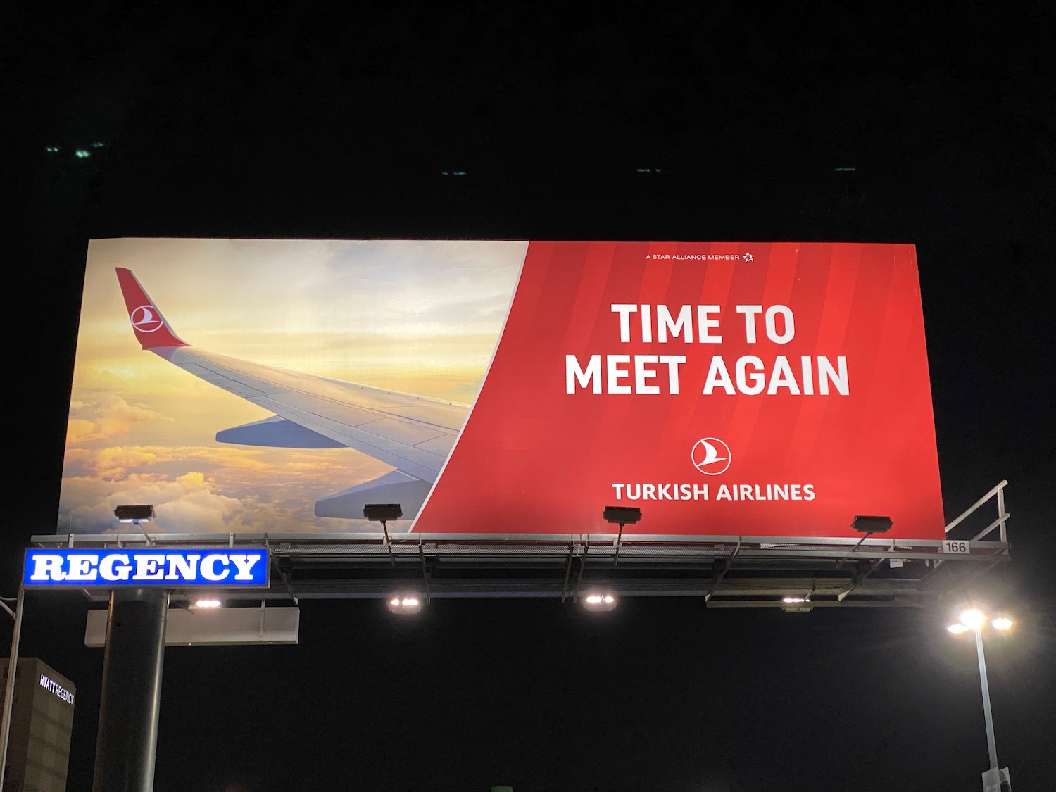 a billboard with an airplane wing on it
