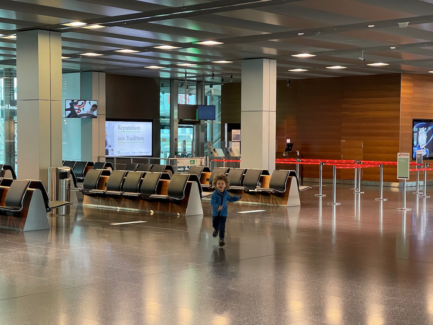 a child running in an airport