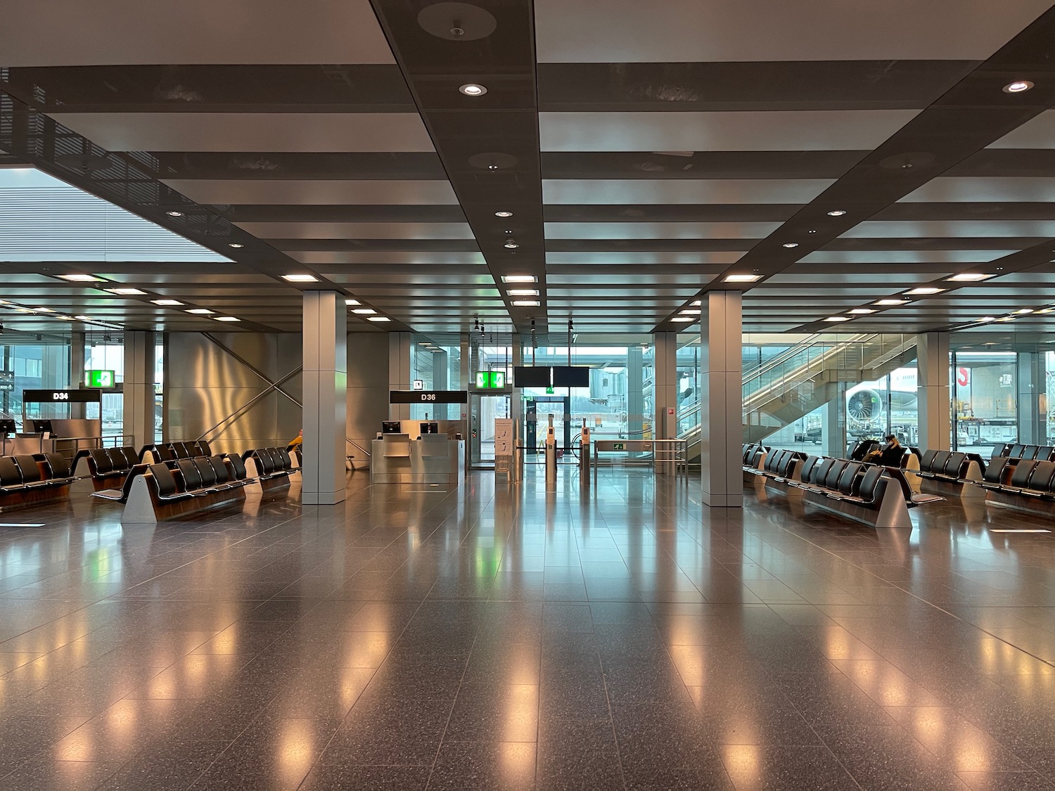 a large hall with benches and stairs