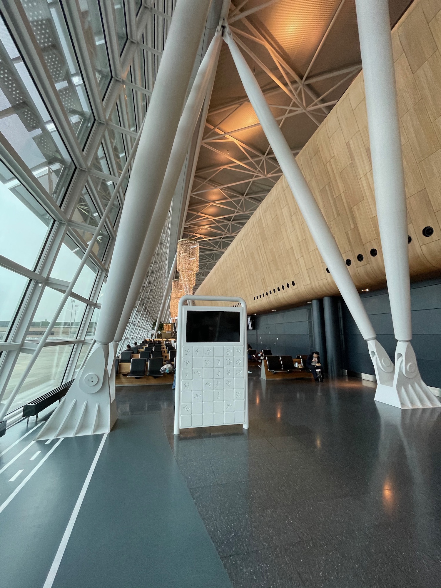 a white metal structure in a building