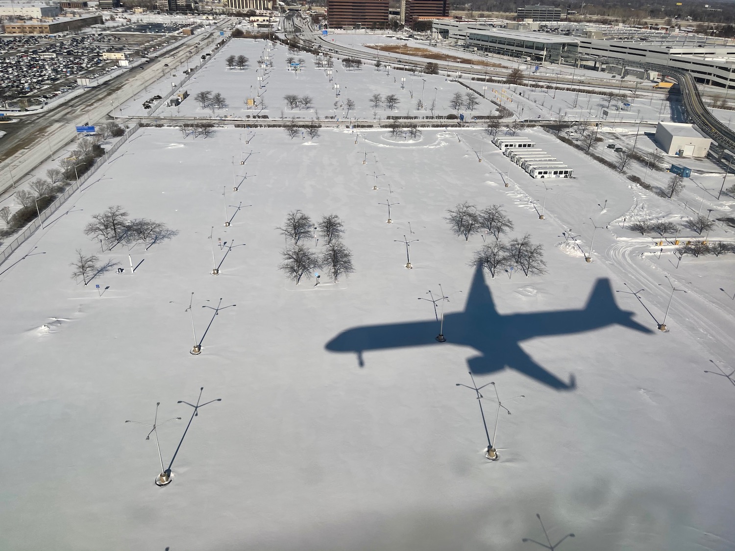 an airplane shadow on the ground