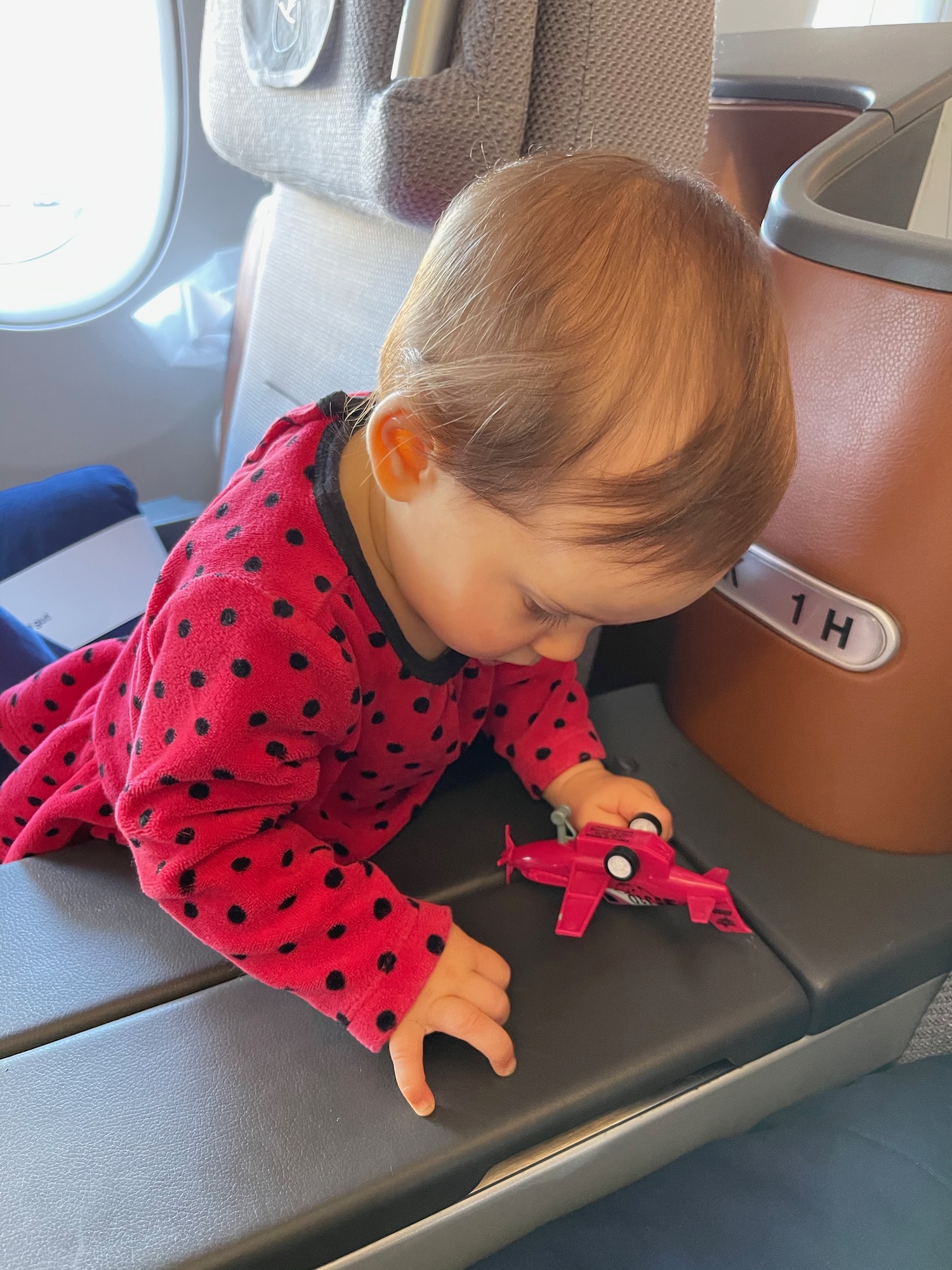 a baby playing with a toy