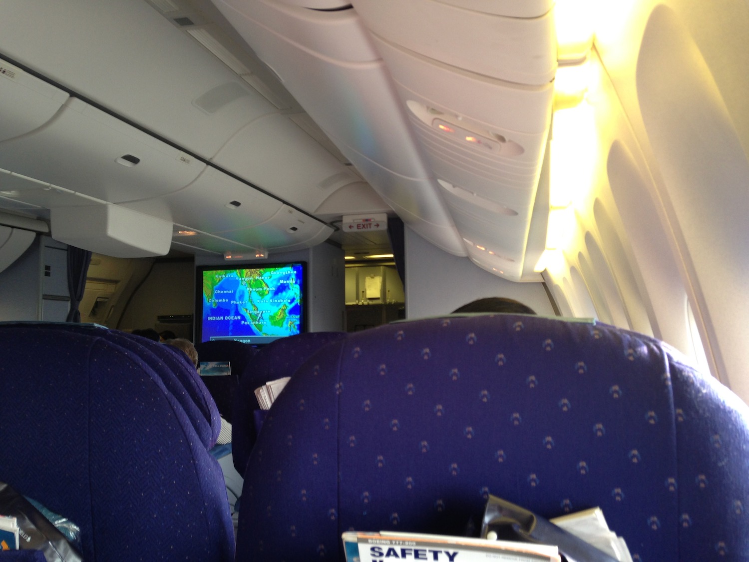 a seat on an airplane with a television