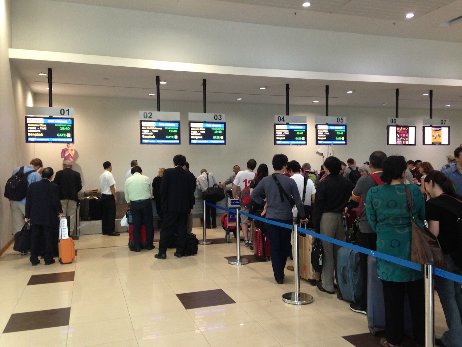 a group of people standing in a line