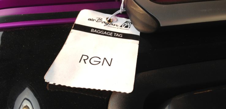 a luggage tag on a luggage handle