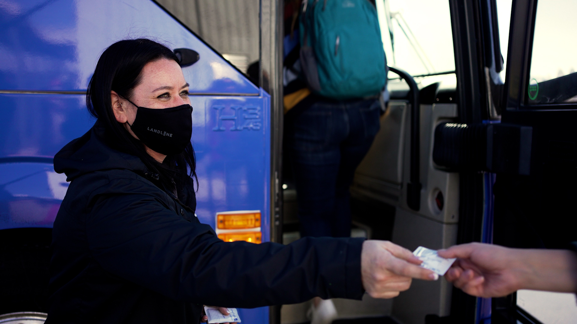 a woman wearing a face mask