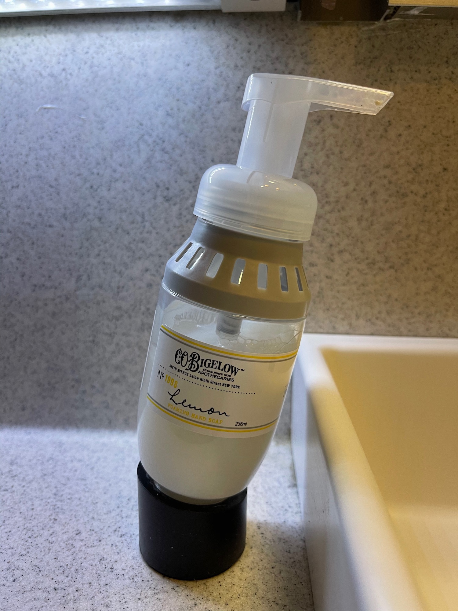 a soap dispenser on a counter