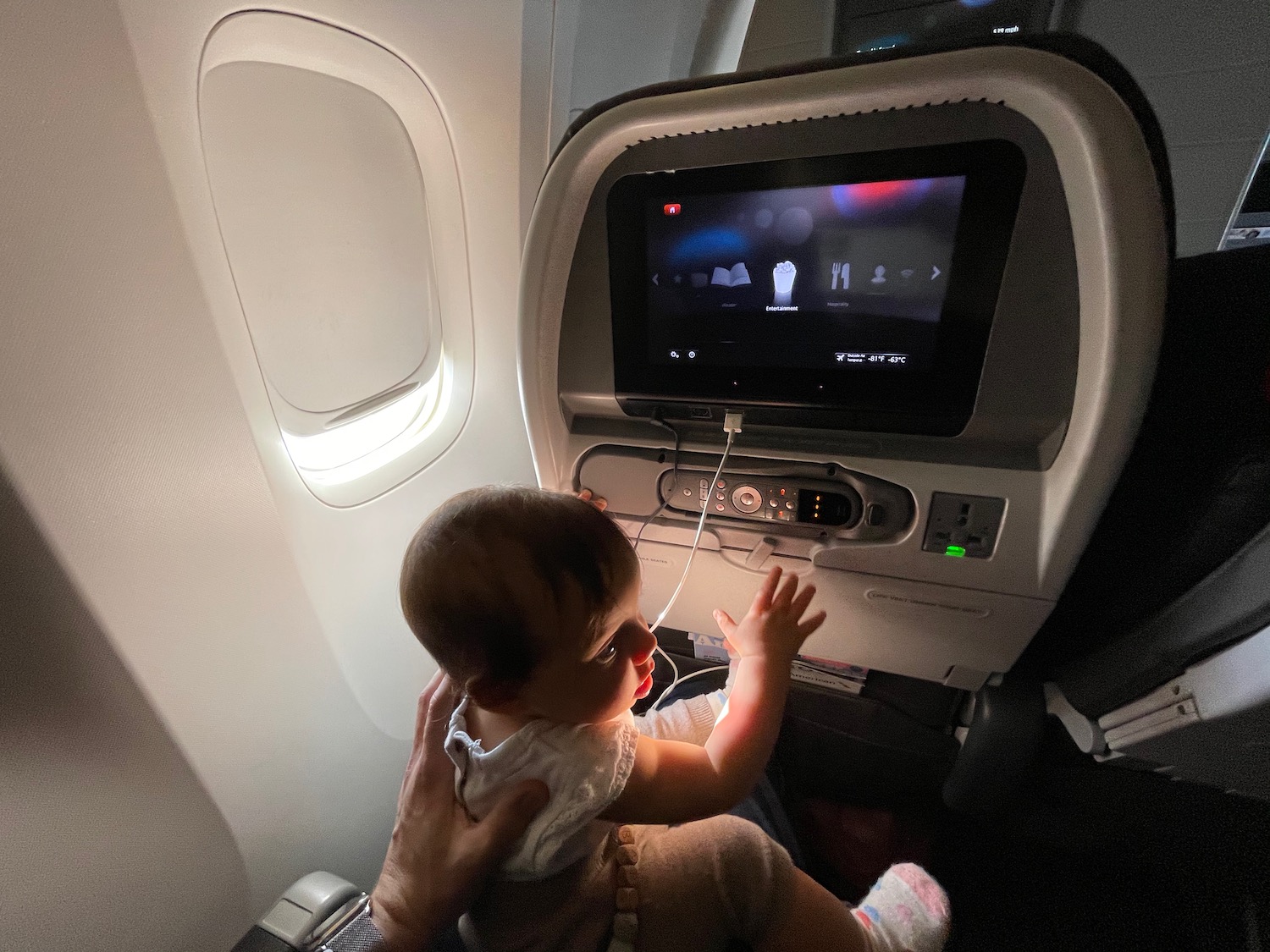 a baby in an airplane
