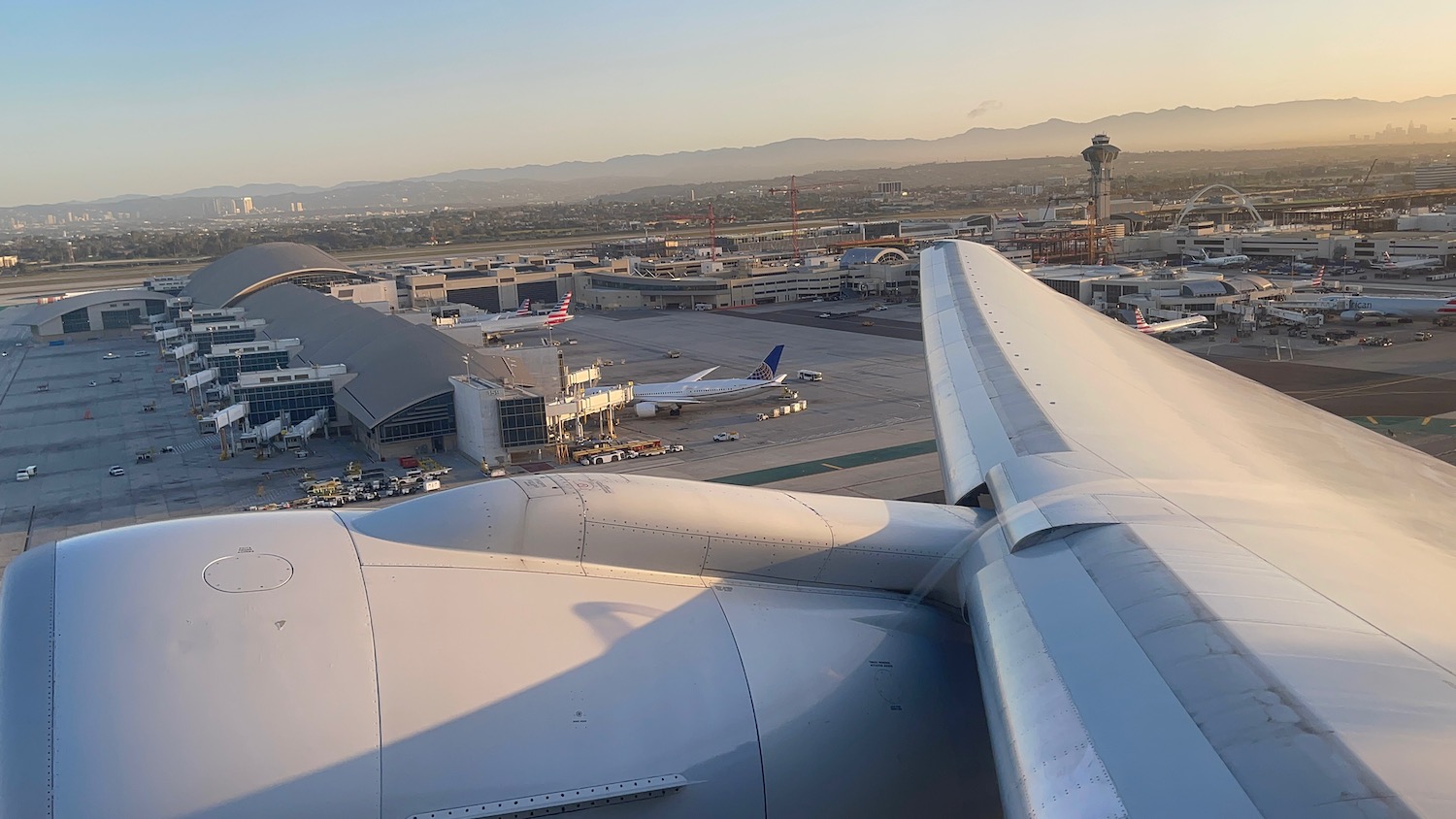 an airplane wing and buildings