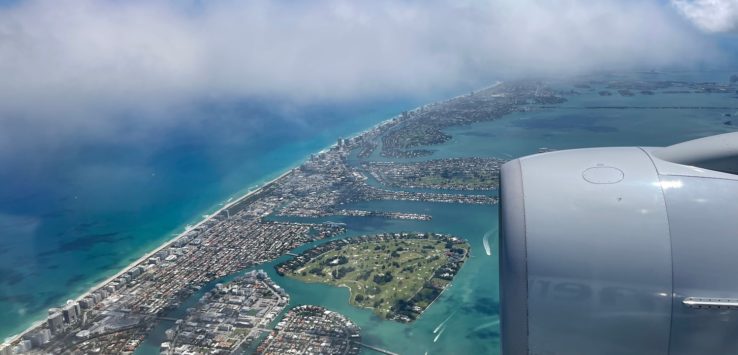 an aerial view of a city and water