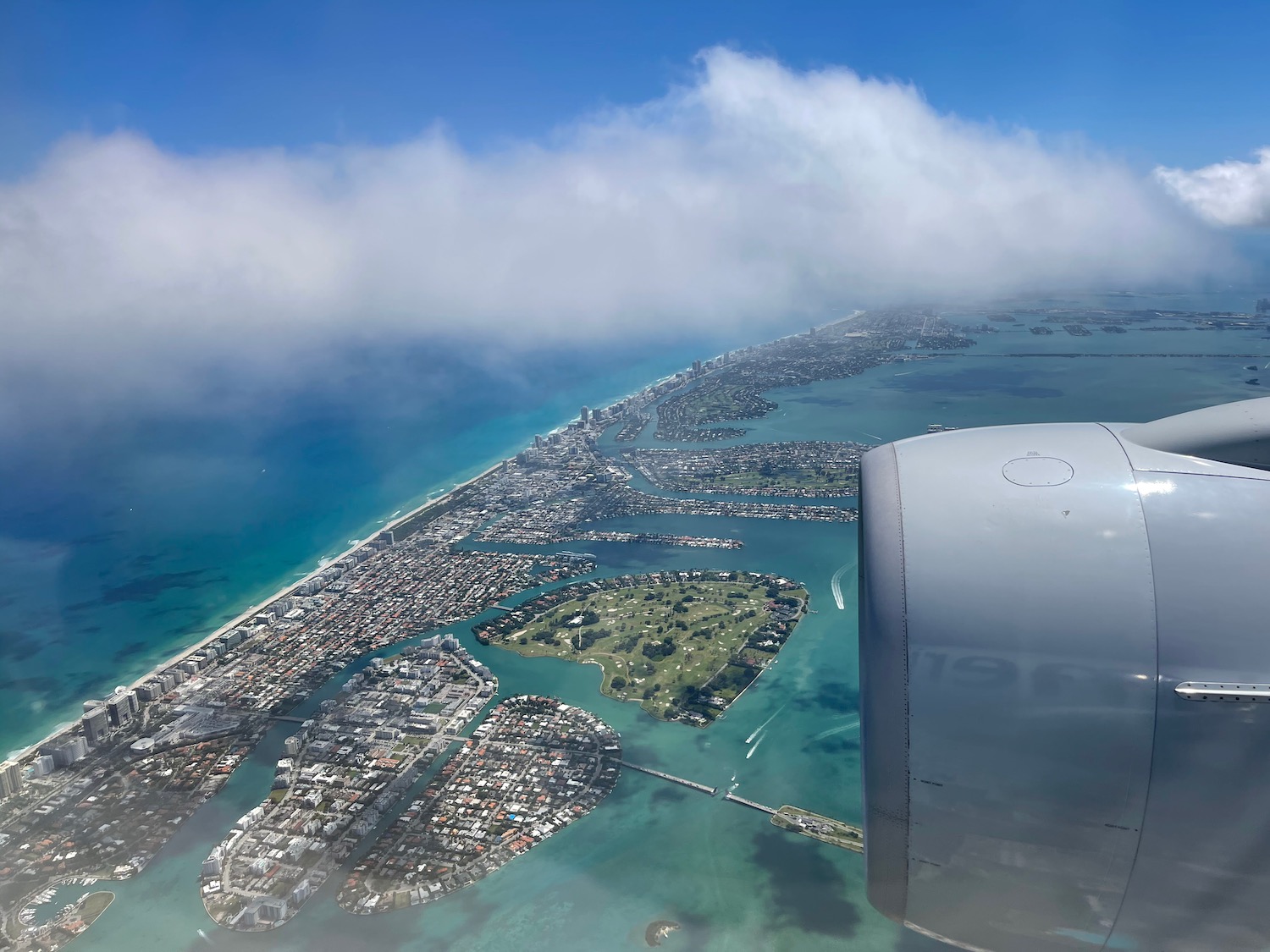 an aerial view of a city and water