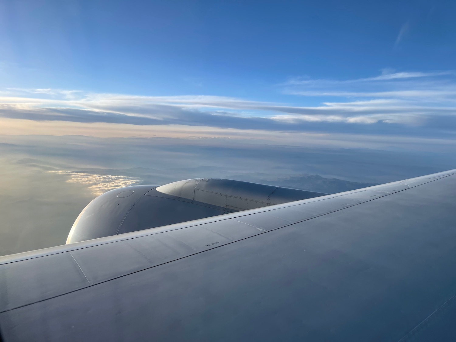 an airplane wing and the sky