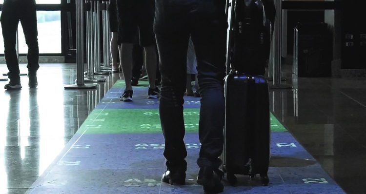 a person walking with luggage