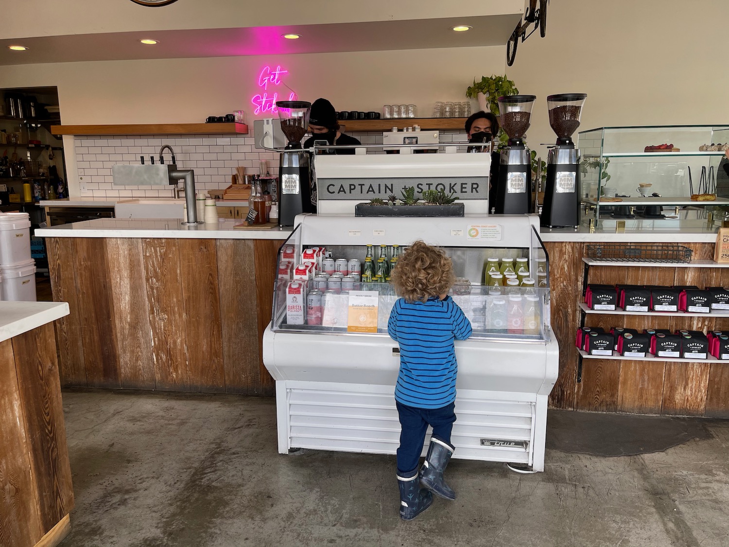 a child standing at a counter