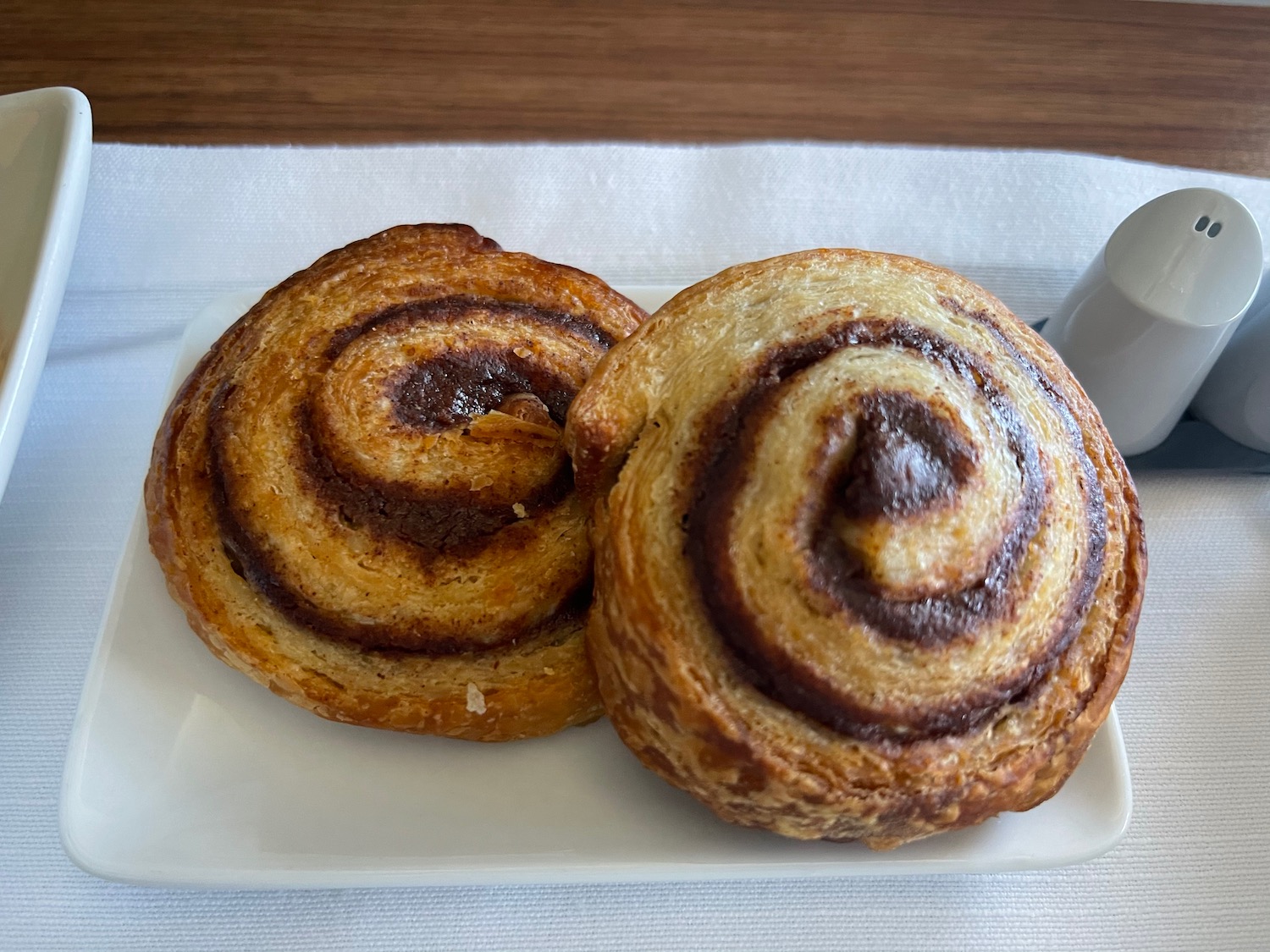 a plate of cinnamon rolls