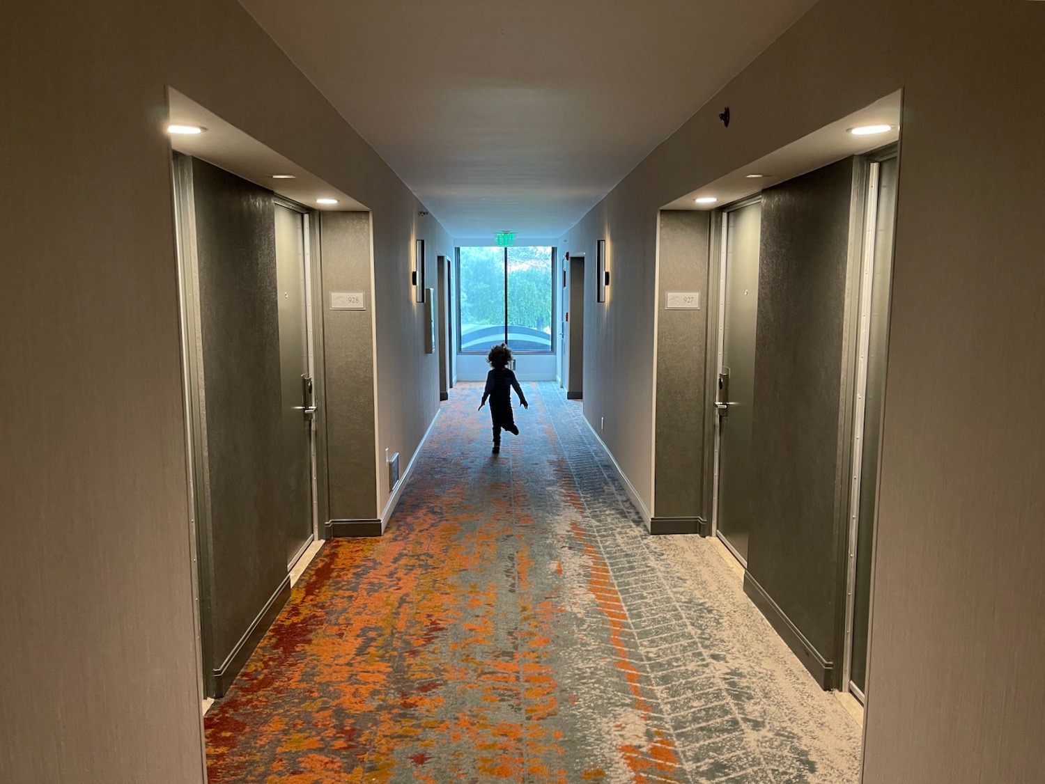 a child running in a hallway