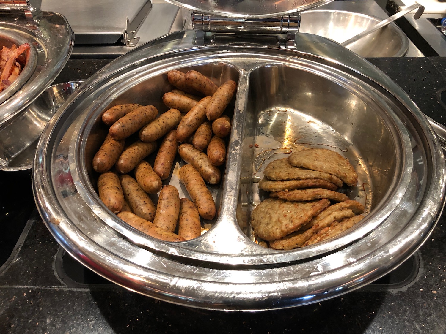 a metal container with food in it