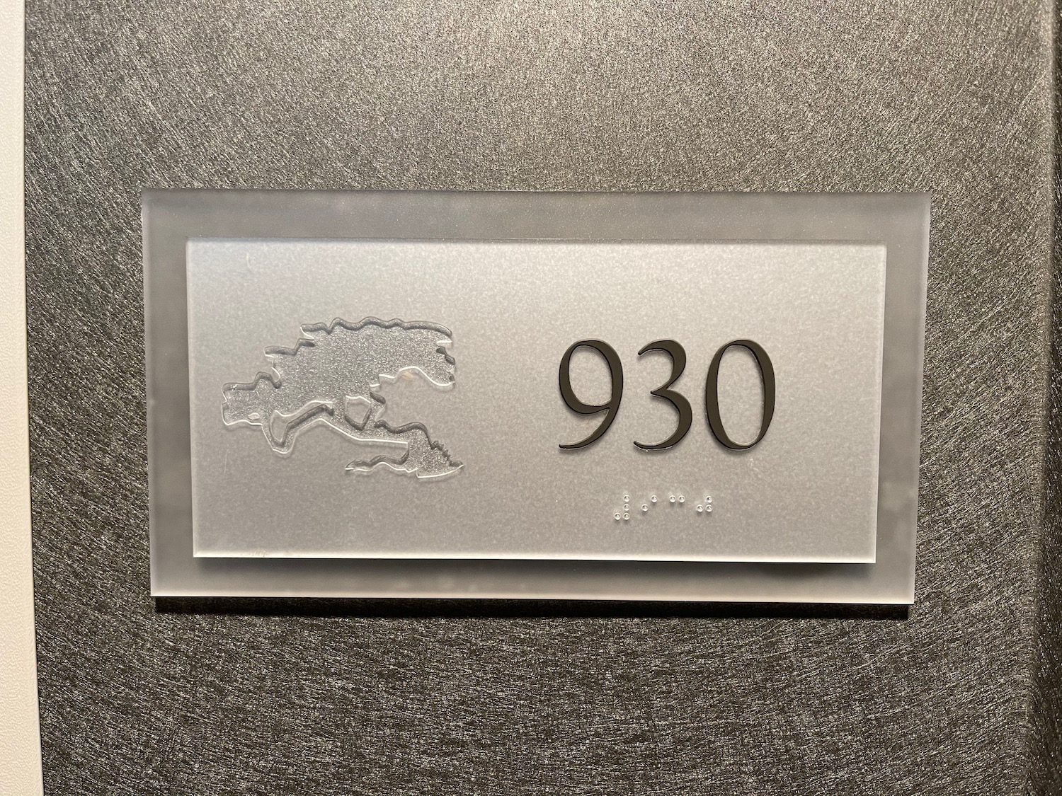 a sign with numbers and a horse on it