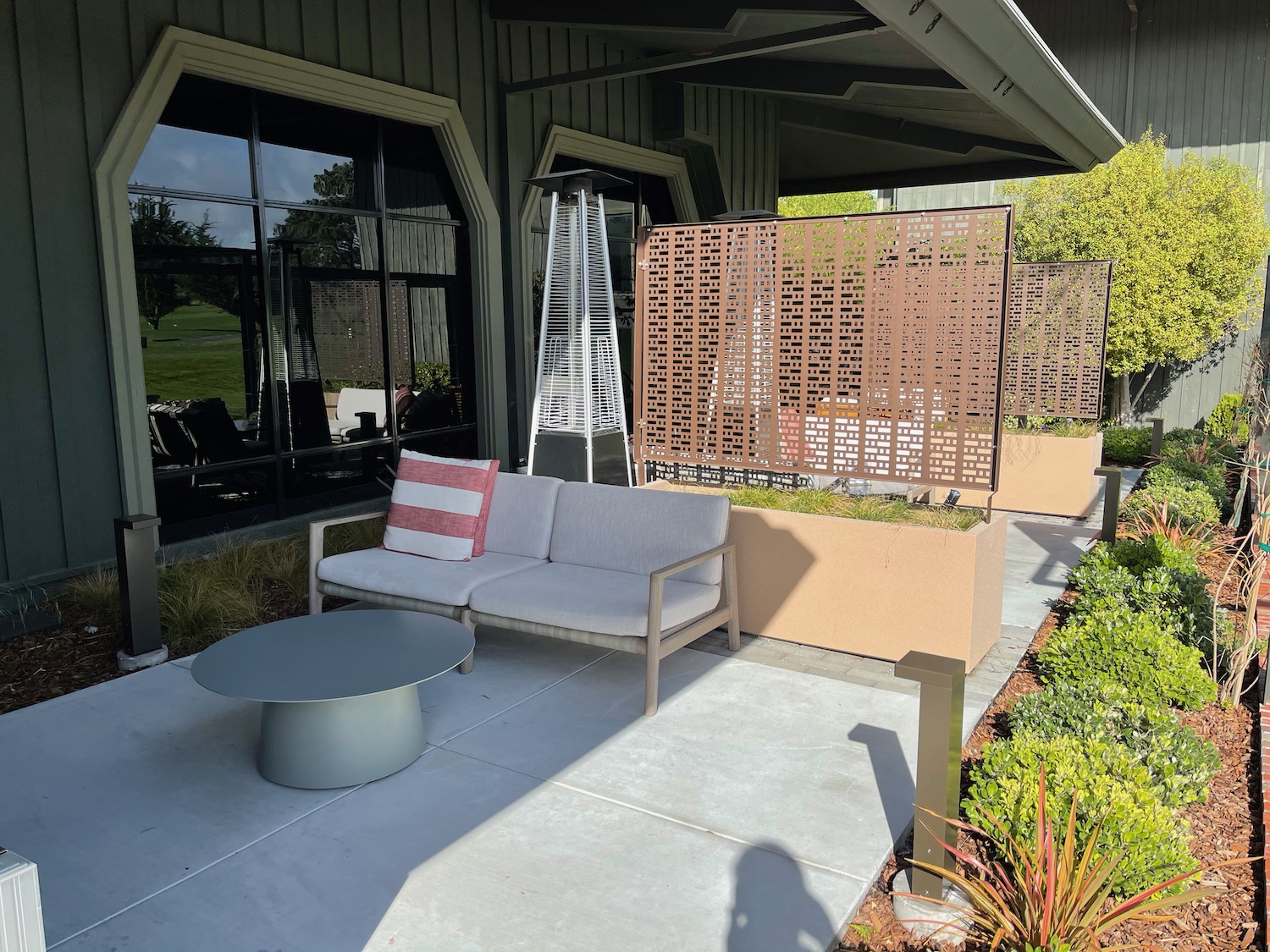 a patio with a couch and a table