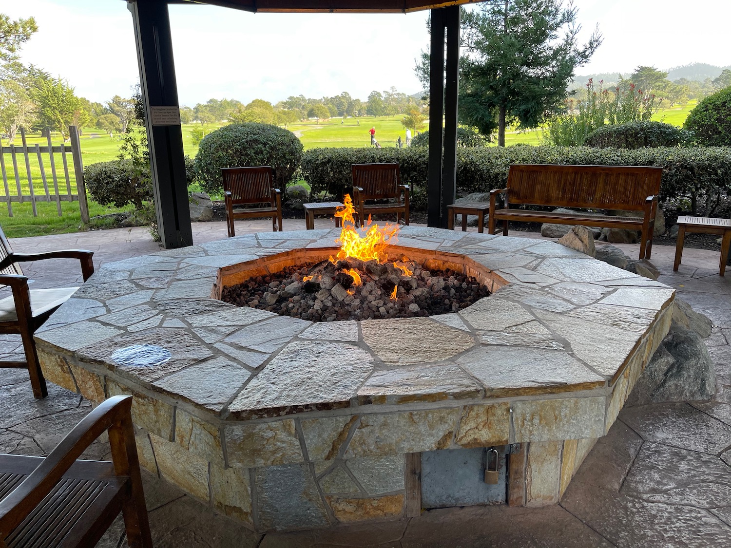 a fire pit with a fire in it