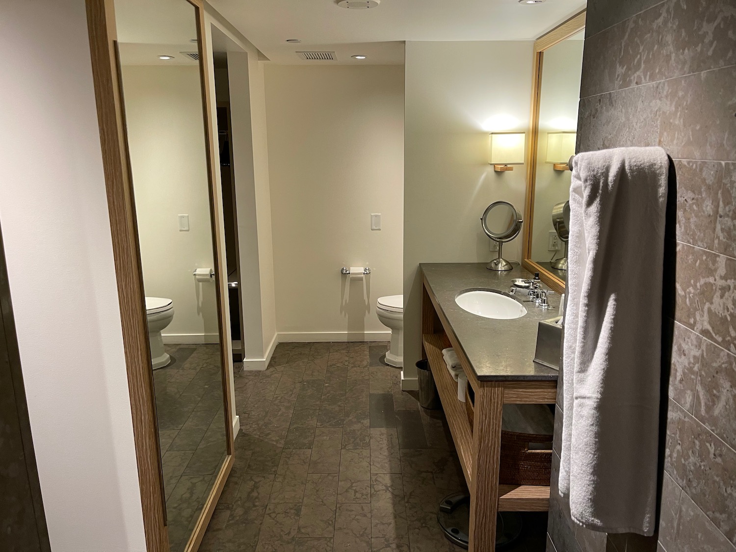 a bathroom with a mirror and sink