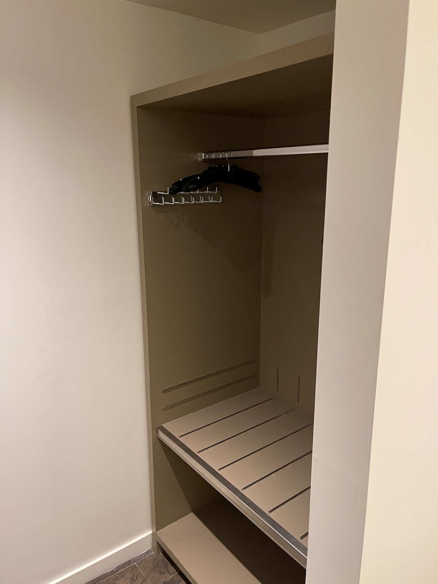 a closet with a shelf