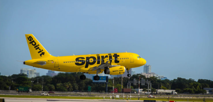 a yellow airplane taking off