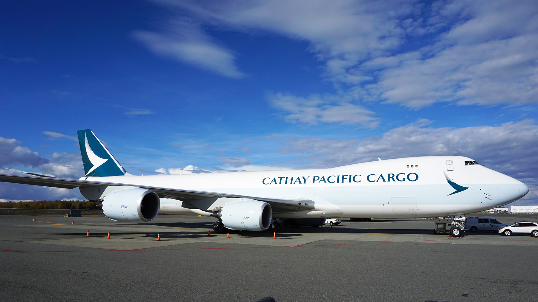 a large white airplane on a runway