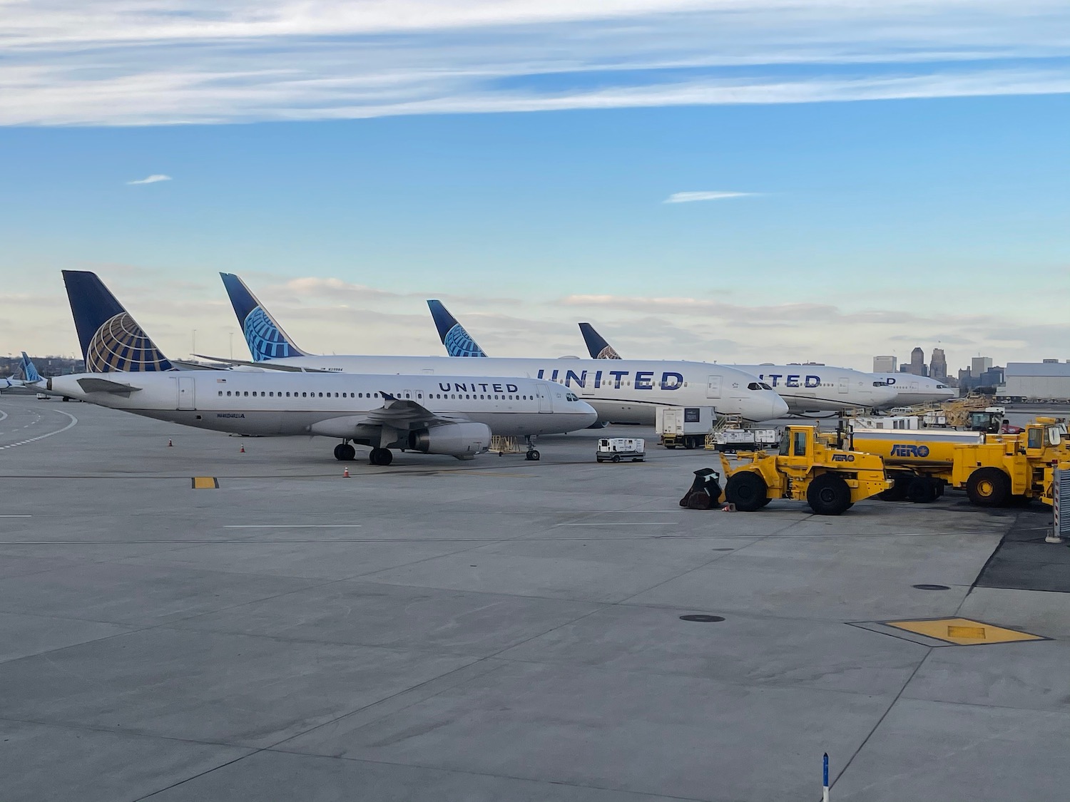 airplanes parked on a tarmac