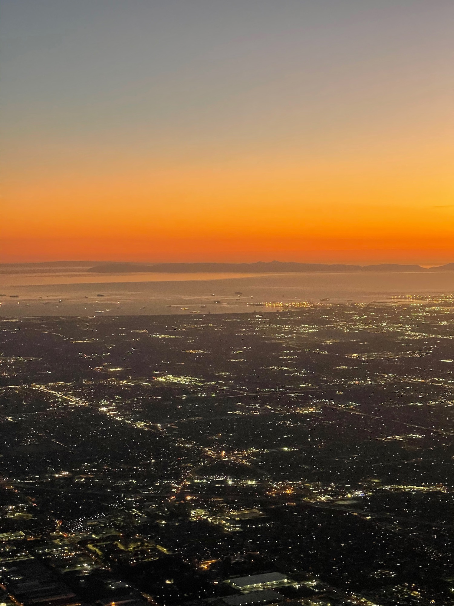 a city lights at sunset