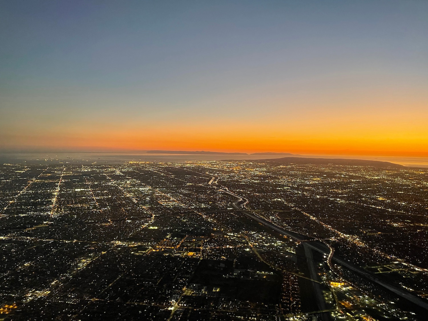 an aerial view of a city at night