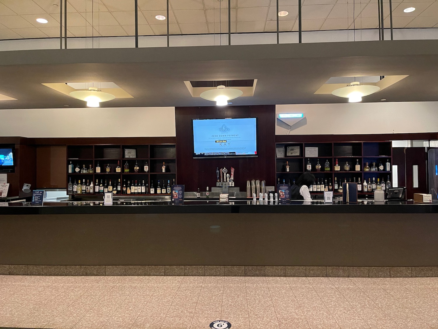 a bar with bottles on the counter