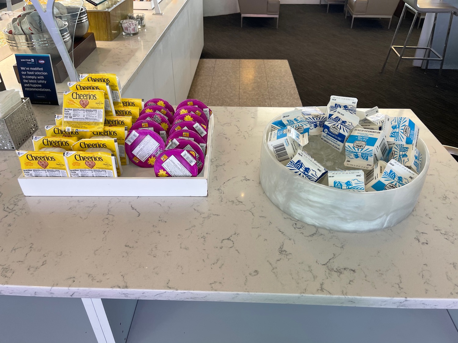a group of boxes of cheese on a counter