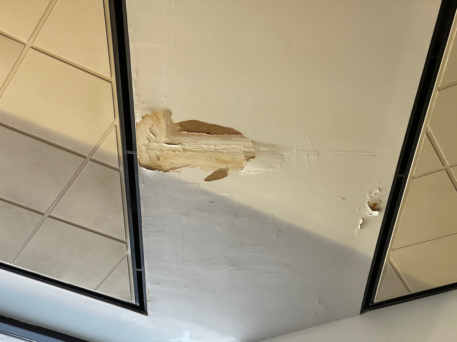 a ceiling with a hole in it