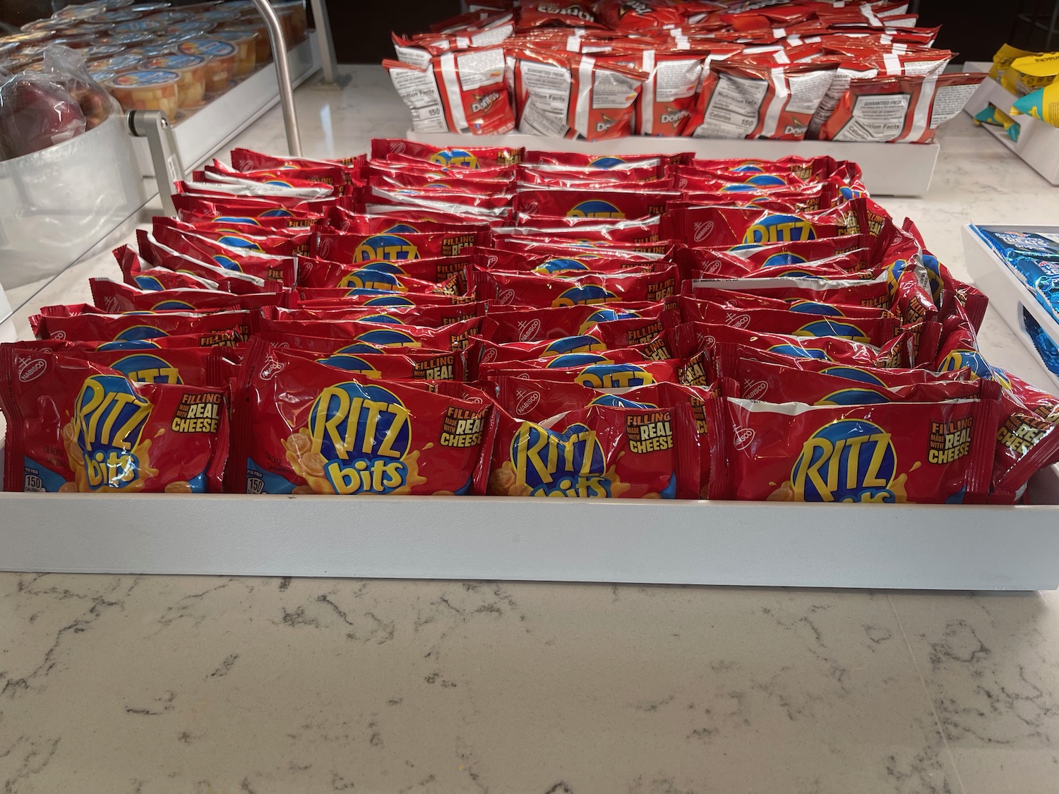 a group of red bags of potato chips